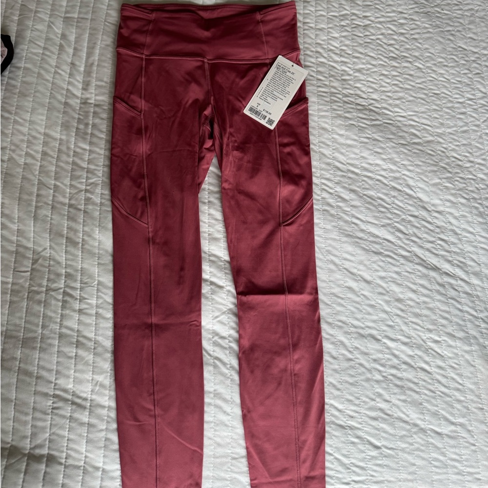 Lululemon Fast and Free High Rise Tight 25" Nulux Running
Leggings Pink